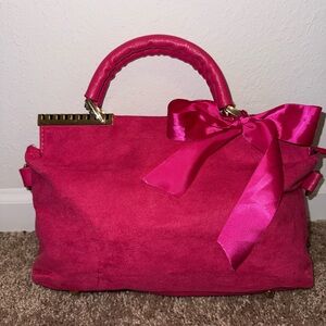 Elegant Pink Handbag with Bow Accent